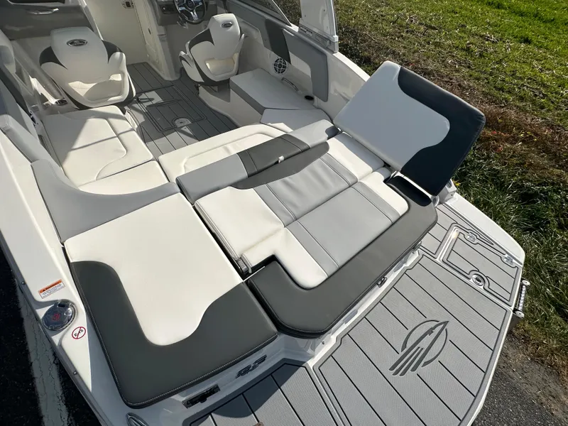 Slide: The Image of 2024 Chaparral 23 SSi boat interior with spacious seating and modern design. - 42