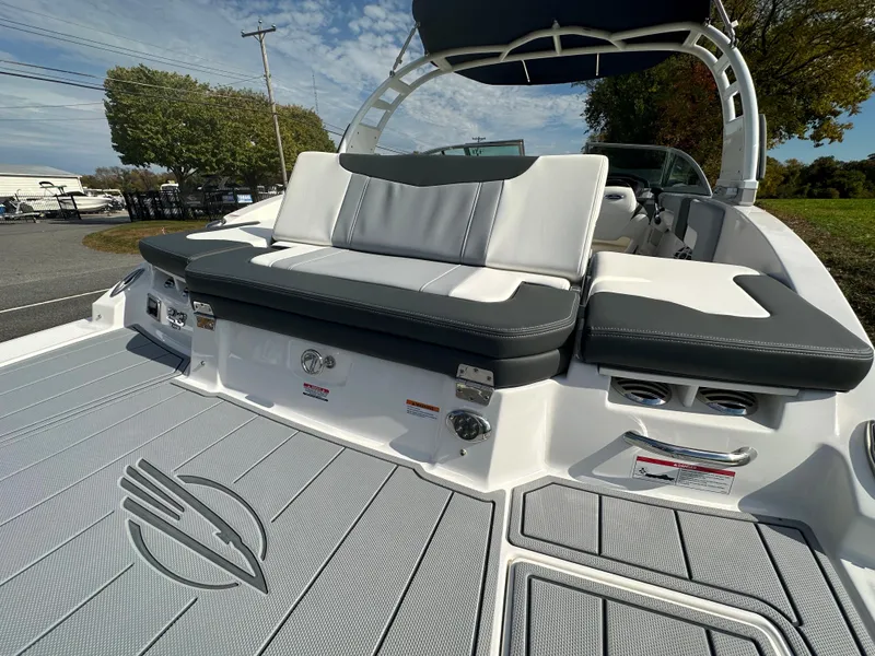 Slide: The Image of 2024 Chaparral 23 SSi boat with spacious seating and modern design. - 45