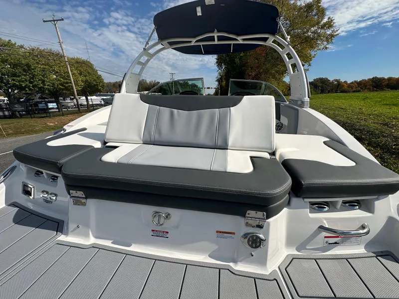Slide: The Image of 2024 Chaparral 23 SSi boat with sleek seating and modern design. - 46
