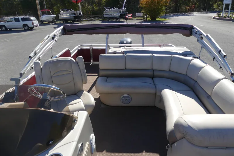 Slide: The Image of 2015 Silver Wave 230 Island F pontoon boat with spacious seating and steering wheel. - 6