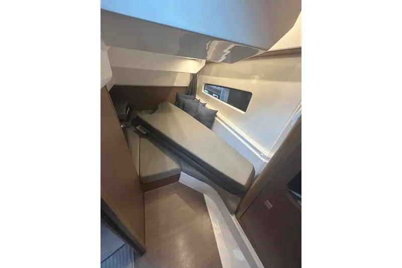 Slide: The Image of 2024 Beneteau Antares 9 cabin interior with modern design and comfortable seating. - 19