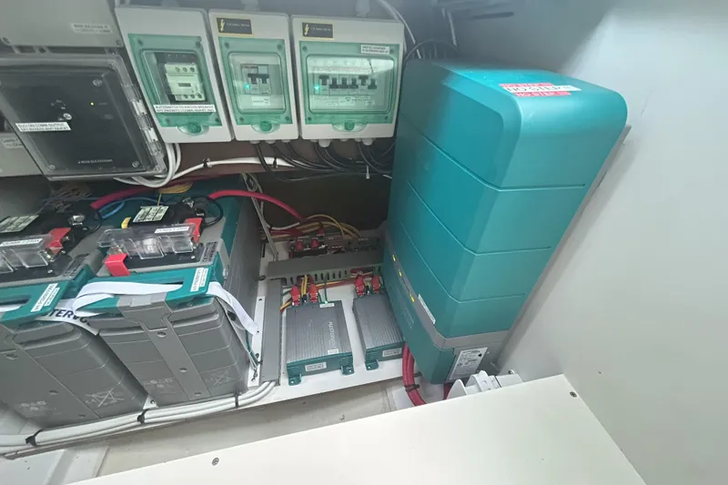 Slide: The Image of Electrical system of 2024 Beneteau Antares 9 boat, featuring batteries and circuit breakers. - 26