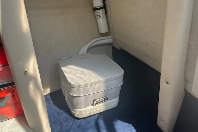 Slide: The Image of Portable toilet inside 2001 Sea Ray 225 Weekender boat cabin. - 13