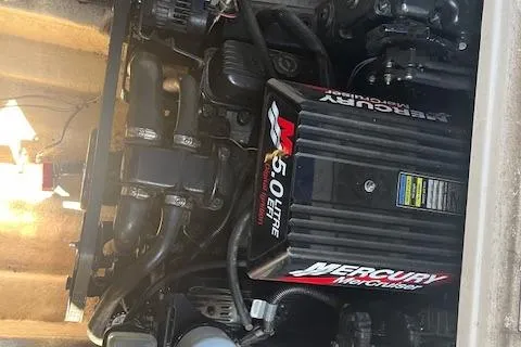 Slide: The Image of 2001 Sea Ray 225 Weekender engine, featuring a Mercury 5.0 Litre motor. - 19