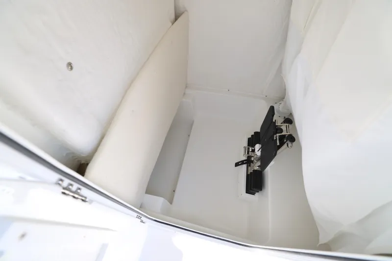 Slide: The Image of Control panel of 2026 Sea Hunt Ultra 235 SE boat with audio system and switches. - 15