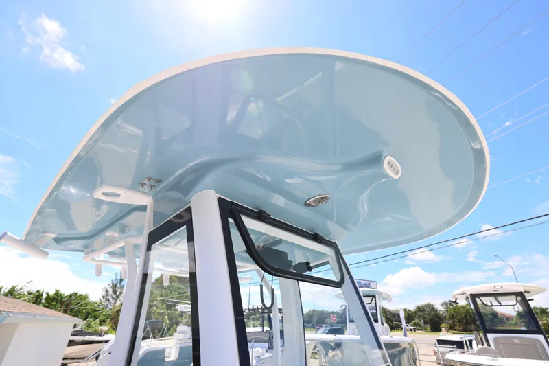 Slide: The Image of Interior storage compartment of 2026 Sea Hunt Ultra 235 SE boat. - 17