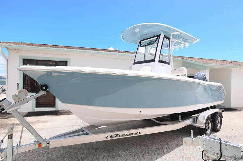 Slide: The Image of 2026 Sea Hunt Ultra 235 SE boat top view with rod holders and speakers. - 6
