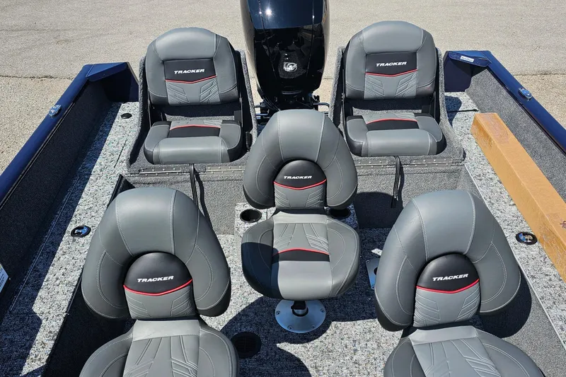 Slide: The Image of 2026 Bass Tracker PGV 175 boat interior with gray and red cushioned seats. - 15