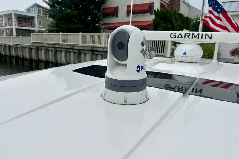 Slide: The Image of 2022 Tiara Yachts 38 LS with Garmin and FLIR technology on deck. - 16