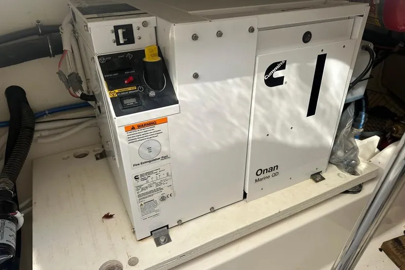 Slide: The Image of Cummins Onan Marine QD generator in 2022 Tiara Yachts 38 LS engine room. - 22