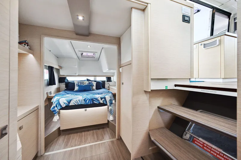 Slide: The Image of Interior of 2018 Fountaine Pajot Lucia 40 catamaran, featuring a cozy bedroom and modern design. - 24