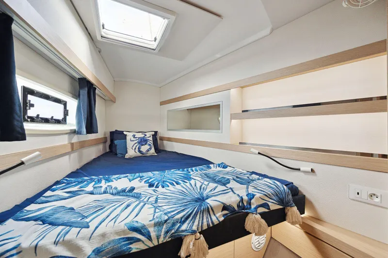 Slide: The Image of Cozy cabin interior of 2018 Fountaine Pajot Lucia 40 with nautical decor. - 38