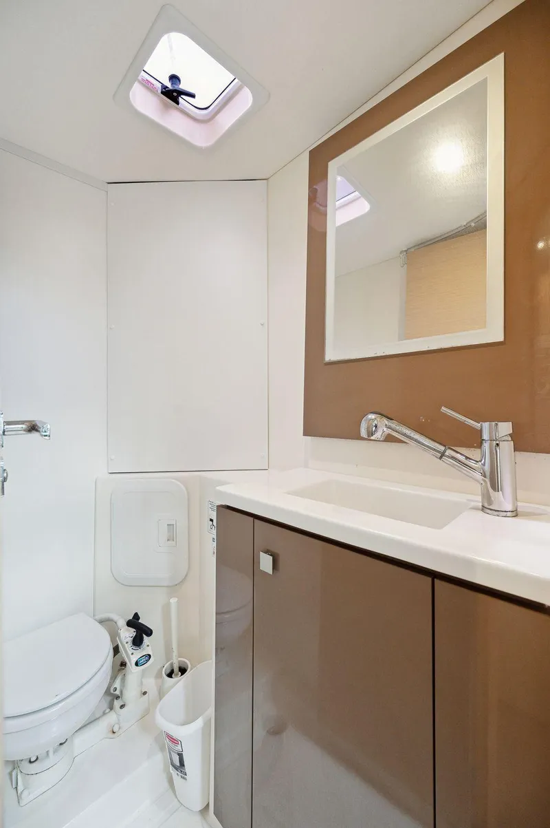 Slide: The Image of Modern bathroom in 2018 Fountaine Pajot Lucia 40 catamaran, featuring sleek fixtures and ample lighting. - 43