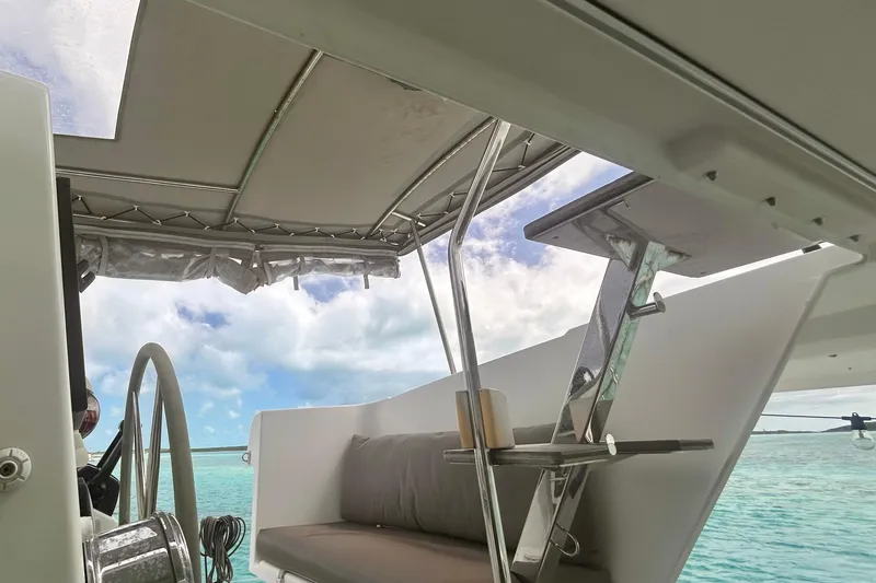 Slide: The Image of 2018 Fountaine Pajot Lucia 40 yacht interior with ocean view and seating area. - 57