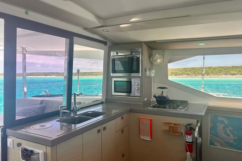 Slide: The Image of Modern kitchen interior of 2018 Fountaine Pajot Lucia 40 catamaran with ocean view. - 6