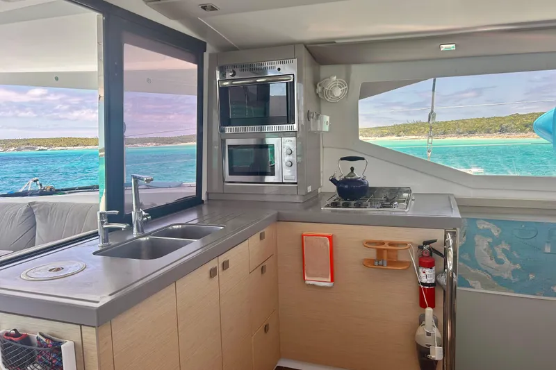 Slide: The Image of Modern kitchen interior of 2018 Fountaine Pajot Lucia 40 catamaran with ocean view. - 7