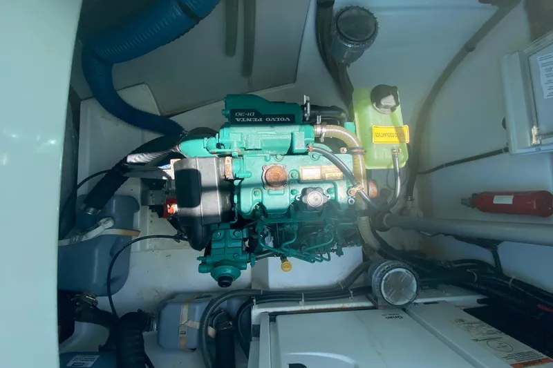 Slide: The Image of Engine compartment of a 2018 Fountaine Pajot Lucia 40 catamaran, featuring a Volvo Penta engine. - 79