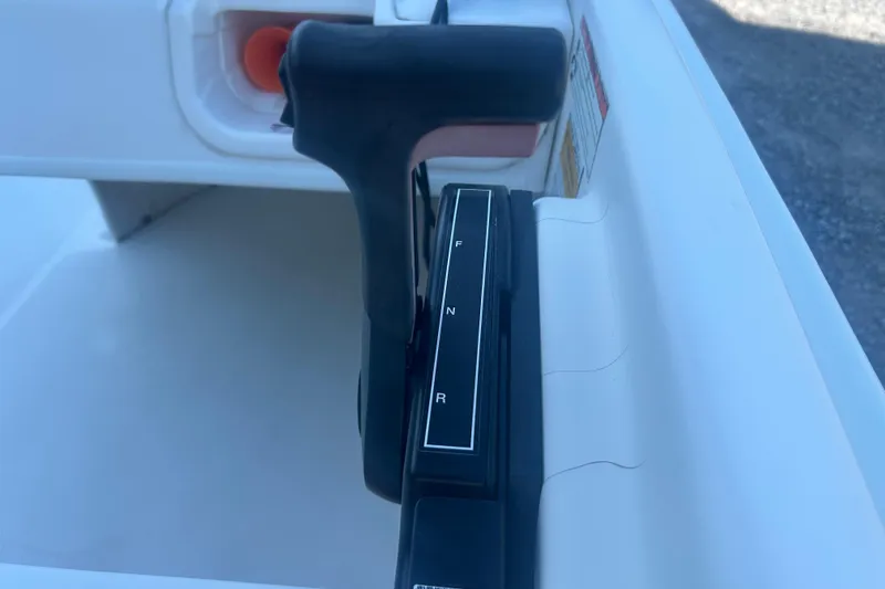 Slide: The Image of Throttle control of a 2010 Boston Whaler 130 Super Sport boat. - 10