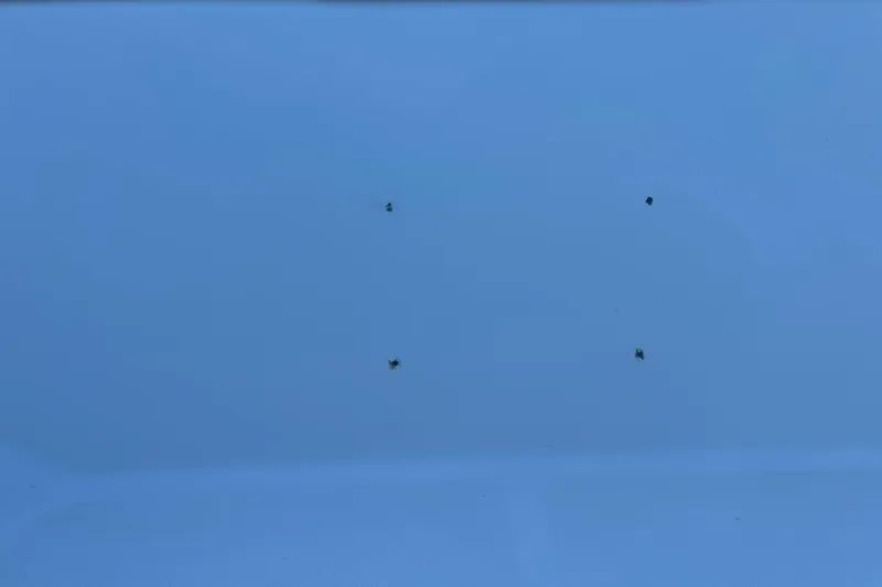 Slide: The Image of Close-up of a 2010 Boston Whaler 130 Super Sport boat hull on a trailer. - 14