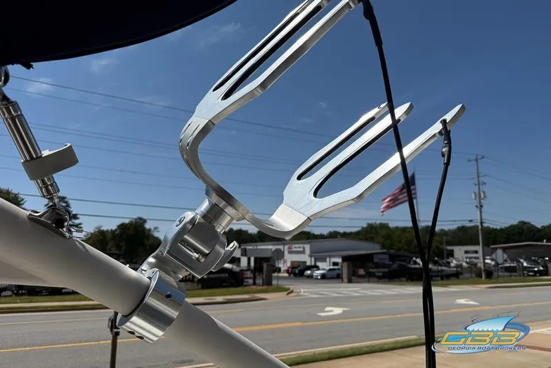 Slide: The Image of Close-up of a 2022 Regal LS2 Surf boat accessory against a clear sky. - 32