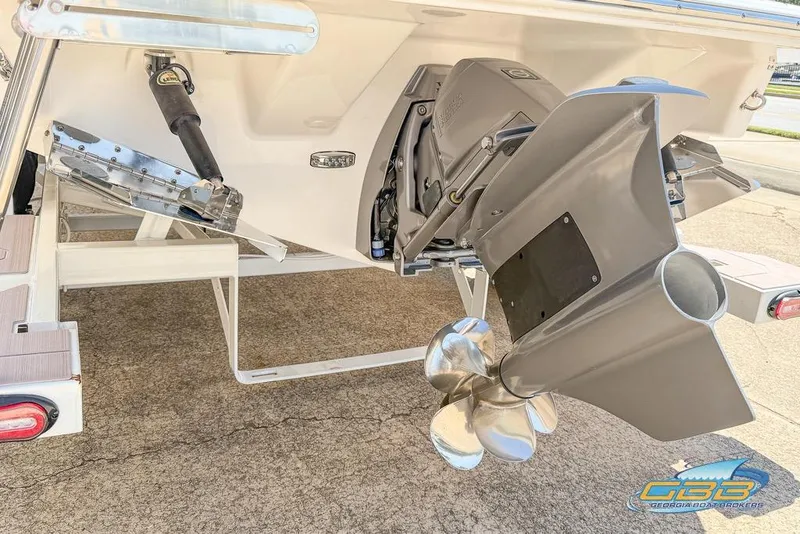 Slide: The Image of 2022 Regal LS2 Surf boat with advanced propulsion system and trim tabs. - 41