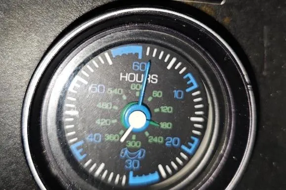 Slide: The Image of Hour meter gauge on 1982 Chris-Craft 410 Motor Yacht dashboard. - 20