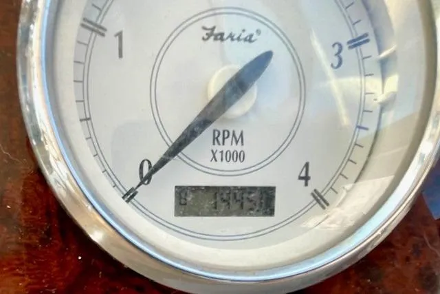 Slide: The Image of Close-up of Faria RPM gauge on 2005 Regal Commodore 4260 boat dashboard. - 19