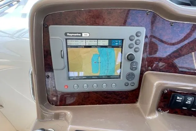 Slide: The Image of Raymarine navigation system on 2005 Regal Commodore 4260 yacht dashboard. - 21