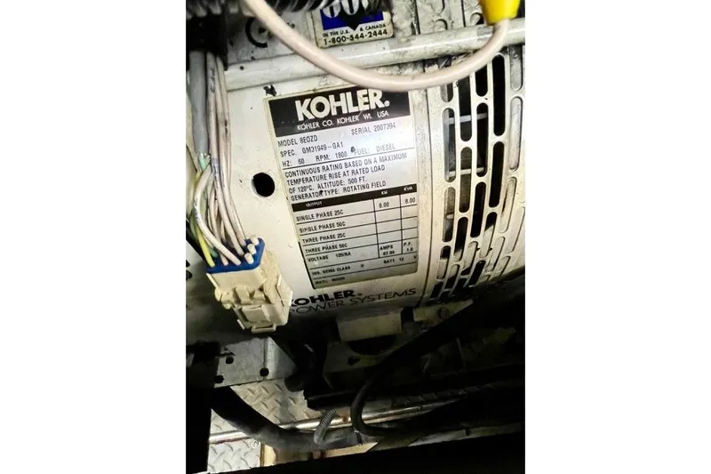Slide: The Image of Kohler generator label on 2005 Regal Commodore 4260, showing specifications and wiring details. - 55