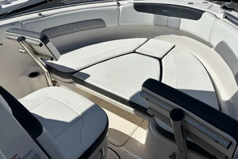 Slide: The Image of 2020 Robalo R222 Center Console boat interior with cushioned seating. - 5