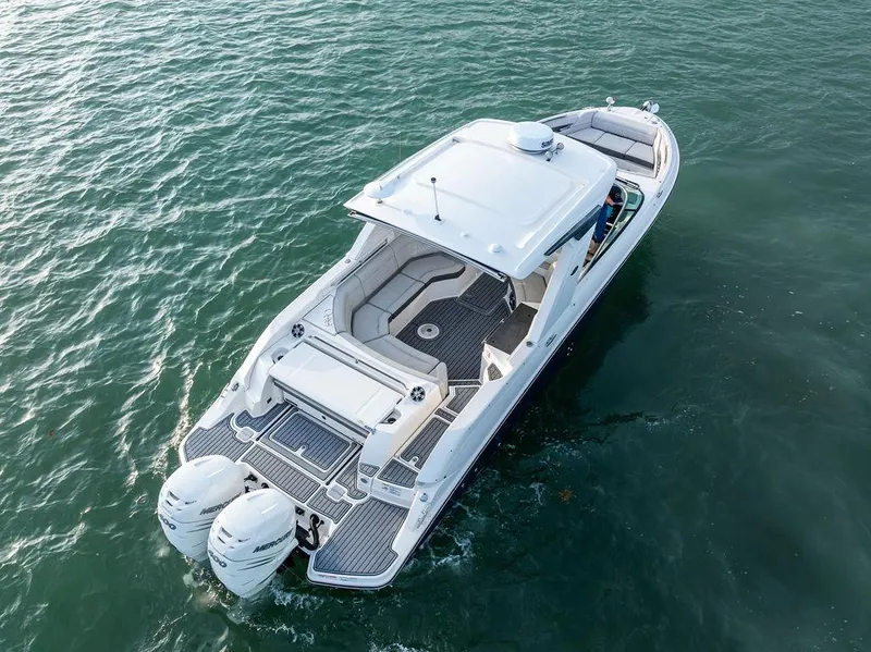 The Image of 2021 Sea Ray 350 SLX OB boat cruising on open water. - 0