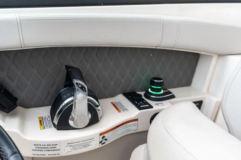 Slide: The Image of Control panel of 2021 Sea Ray 350 SLX OB boat with throttle and joystick. - 18