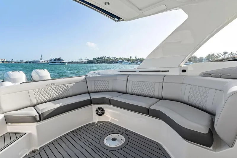 Slide: The Image of Luxurious seating on 2021 Sea Ray 350 SLX OB boat with ocean view. - 25