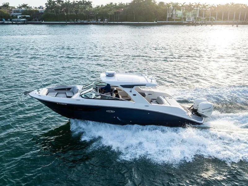 Slide: The Image of 2021 Sea Ray 350 SLX OB cruising on a sunny day, showcasing sleek design and powerful performance. - 38