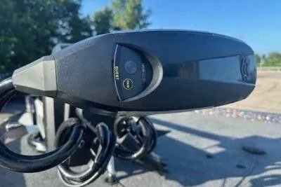 Slide: The Image of Close-up of a 2026 Skeeter ZXE21 boat motor, showcasing sleek design and advanced technology. - 6