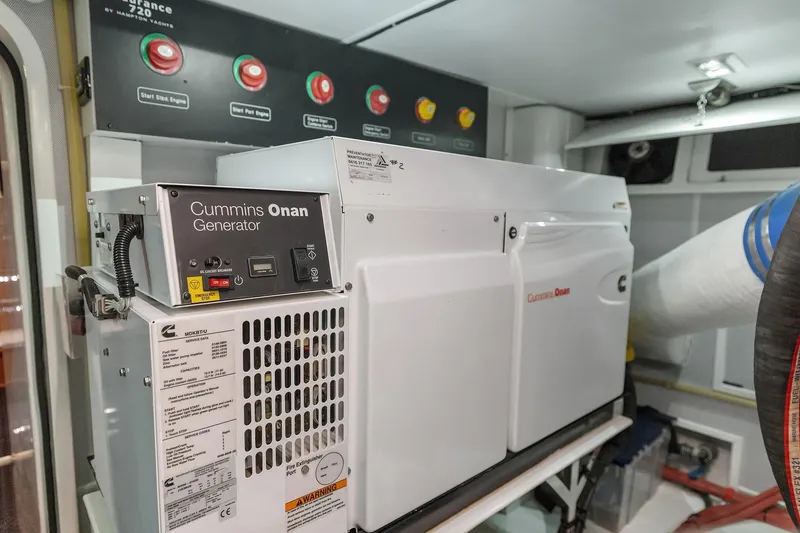 Slide: The Image of 2014 Hampton 720 Skylounge LRC yacht on serene lake at sunset. - 109