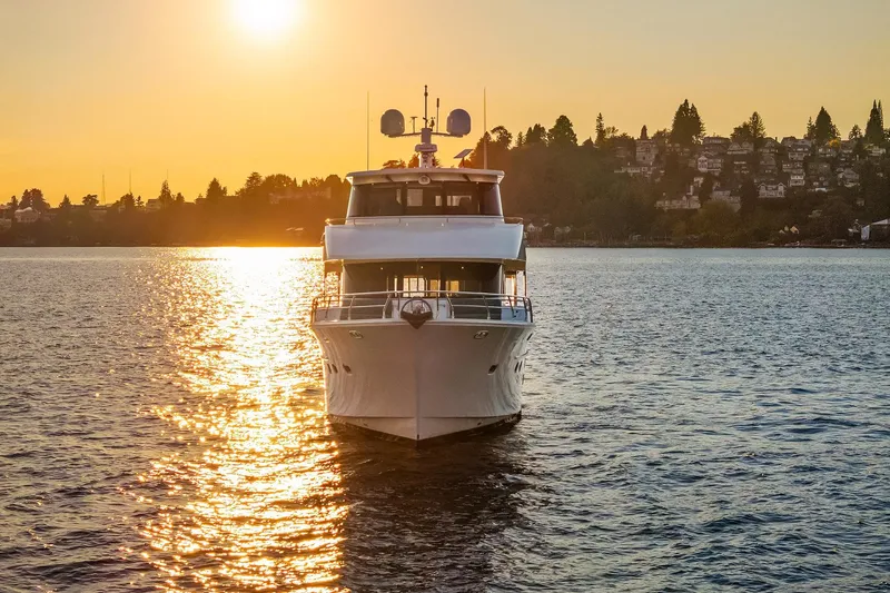 Slide: The Image of Luxury yacht Hampton 720 Skylounge LRC 2014 cruising on serene blue waters at sunset. - 117