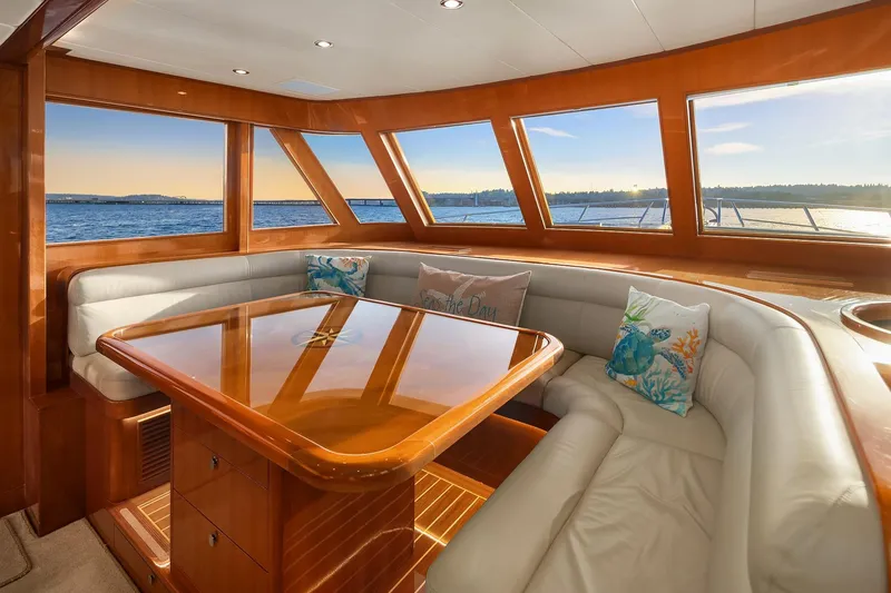 Slide: The Image of Luxurious interior of 2014 Hampton 720 Skylounge LRC yacht with wooden staircase and ocean view. - 27