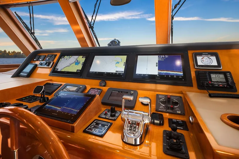 Slide: The Image of Luxurious interior of 2014 Hampton 720 Skylounge LRC yacht with panoramic windows and elegant seating. - 35