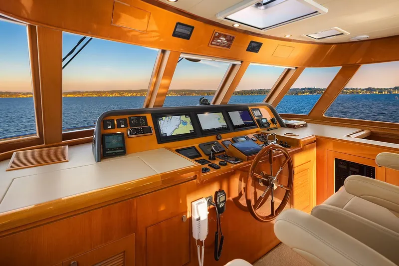 Slide: The Image of Luxurious interior of 2014 Hampton 720 Skylounge LRC yacht with ocean view at sunset. - 36