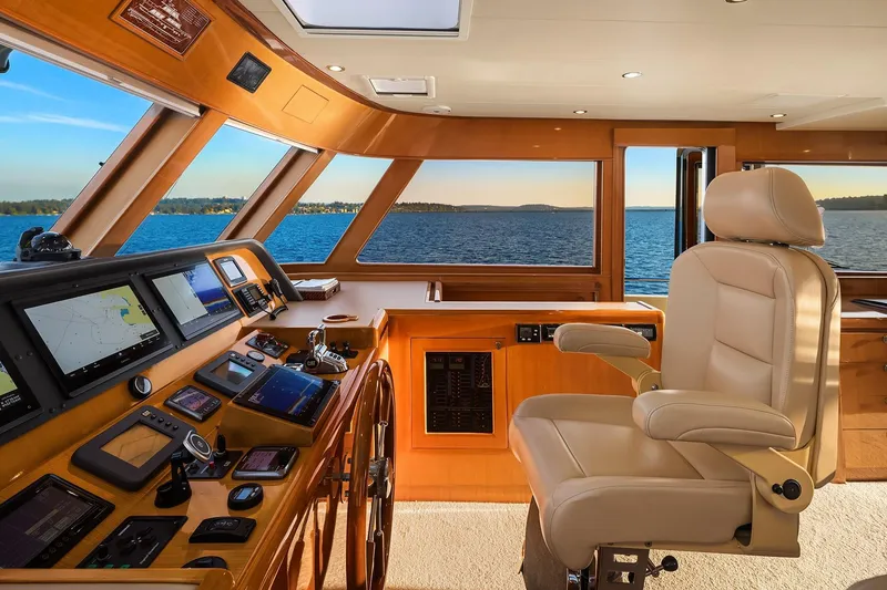 Slide: The Image of Luxurious interior of 2014 Hampton 720 Skylounge LRC yacht with scenic water views. - 37