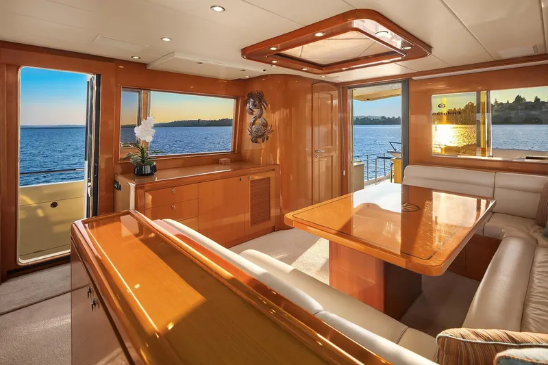 Slide: The Image of Luxurious interior of 2014 Hampton 720 Skylounge LRC yacht with polished wood and elegant staircase. - 42