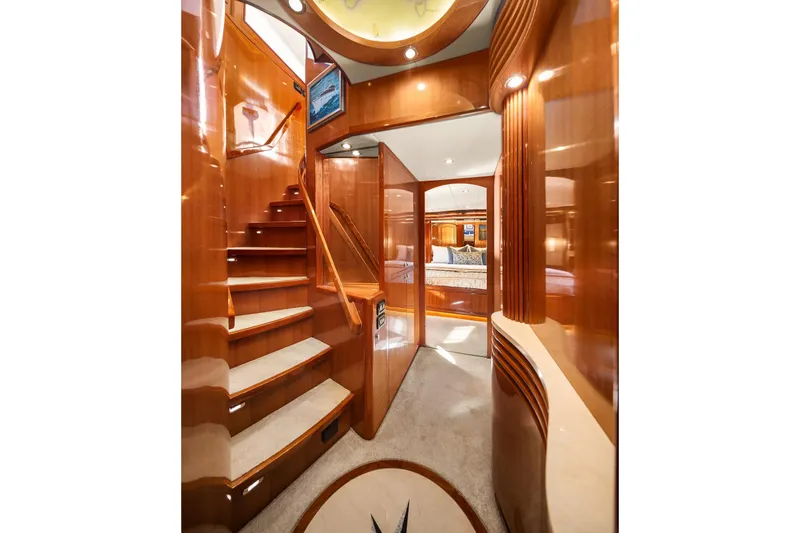 Slide: The Image of Luxurious bedroom interior of 2014 Hampton 720 Skylounge LRC yacht with elegant wood finishes. - 45