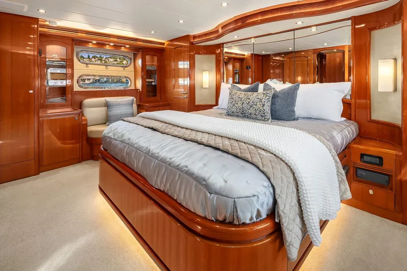 Slide: The Image of Luxurious wooden interior of 2014 Hampton 720 Skylounge LRC yacht with desk and seating. - 47