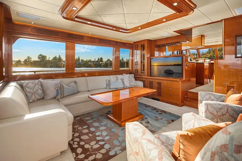 Slide: The Image of Luxurious interior of 2014 Hampton 720 Skylounge LRC yacht with elegant seating and scenic views. - 5