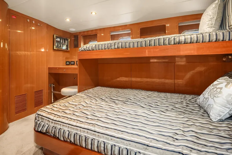 Slide: The Image of Interior of 2014 Hampton 720 Skylounge LRC yacht with control panels and modern cabinetry. - 57