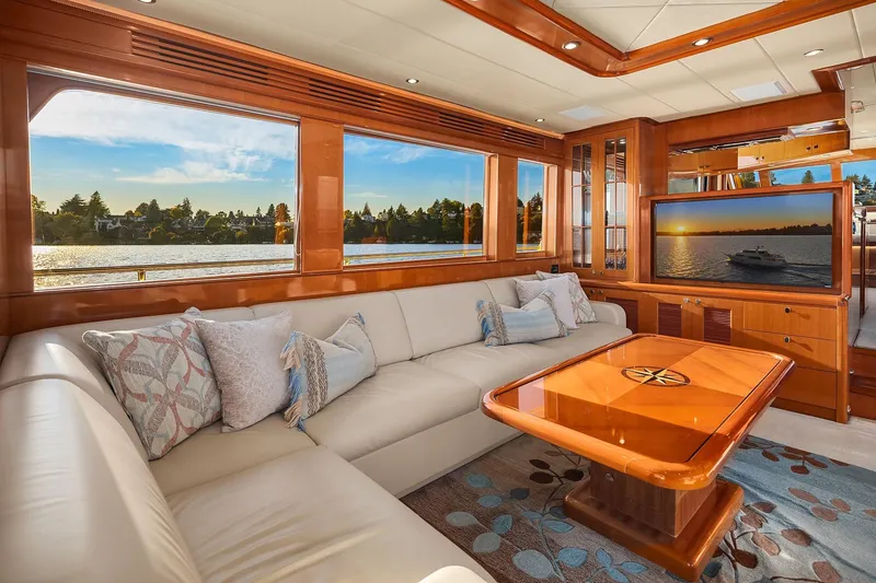 Slide: The Image of Luxurious interior of 2014 Hampton 720 Skylounge LRC yacht with elegant seating and scenic views. - 6