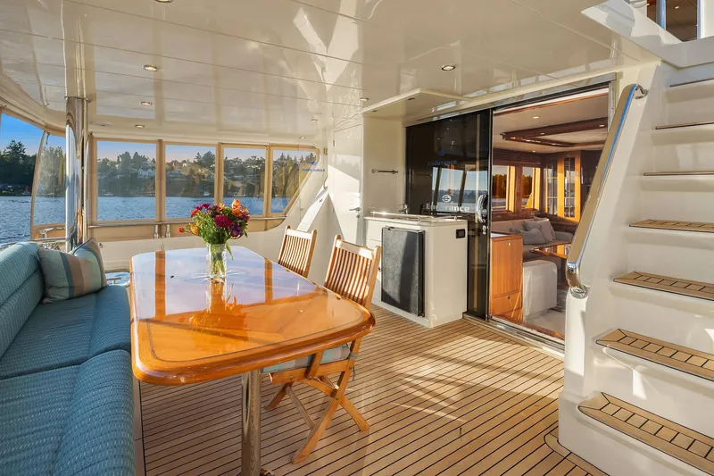 Slide: The Image of Luxurious interior of 2014 Hampton 720 Skylounge LRC yacht with scenic water view. - 65