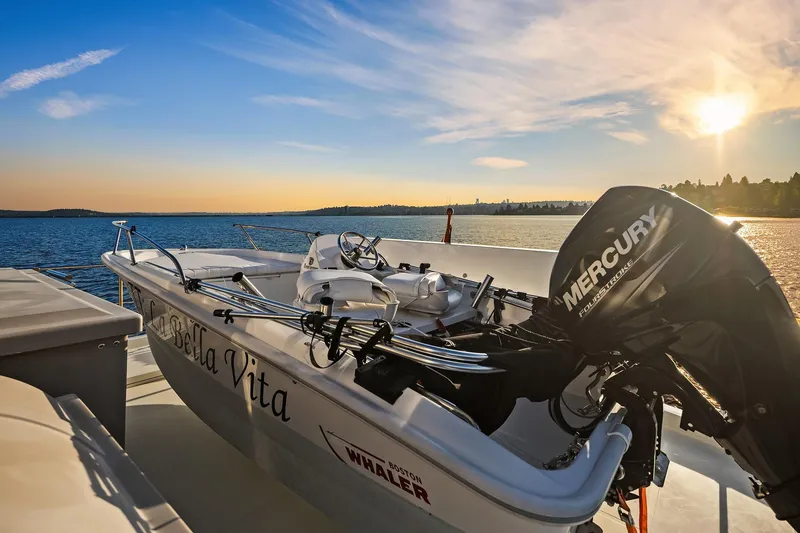 Slide: The Image of 2014 Hampton 720 Skylounge LRC yacht deck with scenic water view. - 66