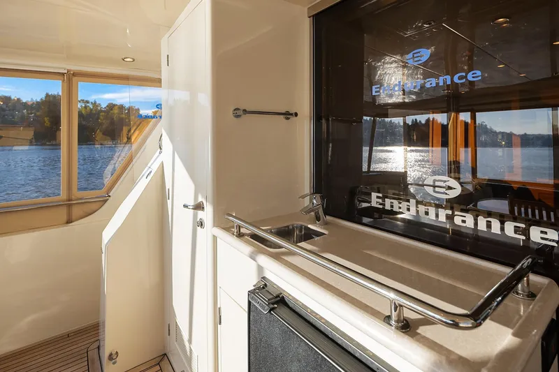 Slide: The Image of Luxurious bathroom in 2014 Hampton 720 Skylounge LRC yacht with elegant fixtures. - 68